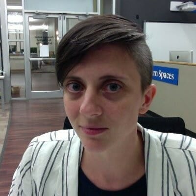 LinkedIn, profile photo, woman in striped blazer